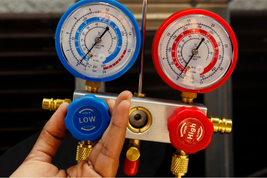 hvac-technician-checking-temperature.jpg