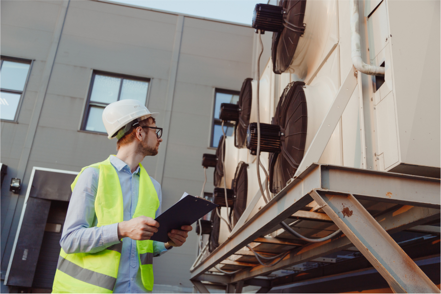 hvac-technician-inspecting-system.jpg