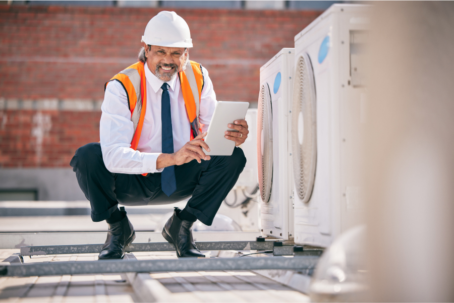 hvac-technician-working-on-ducts.jpg